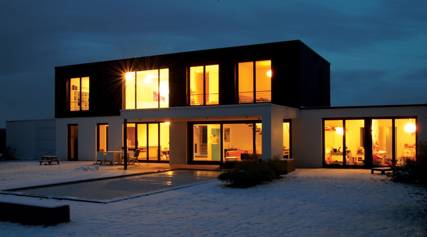 heiderich-architekten-luenen-zweifamilienhaus-p-luenen-mit-licht-im-schnee